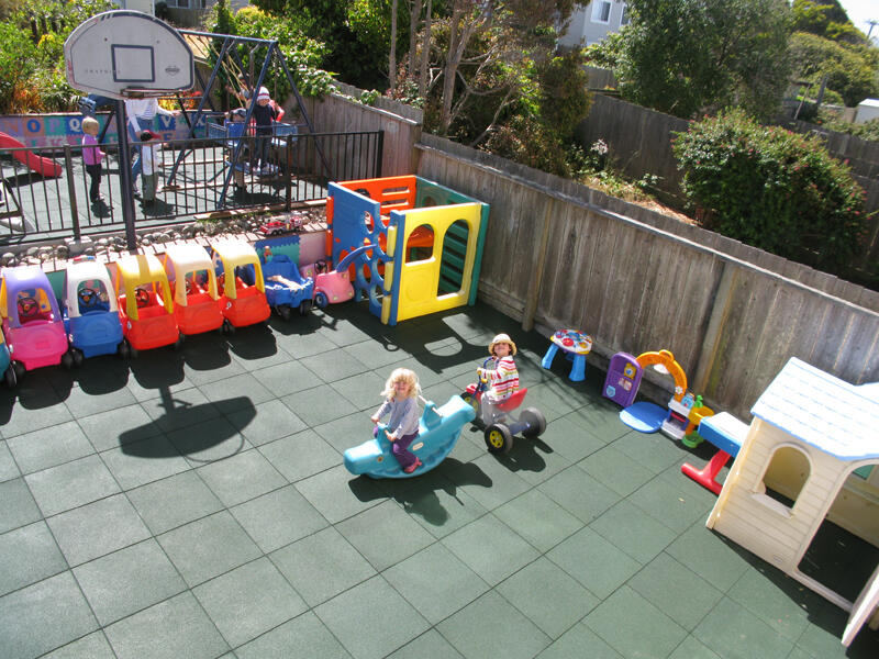 Child playing on outdoor playground equipment