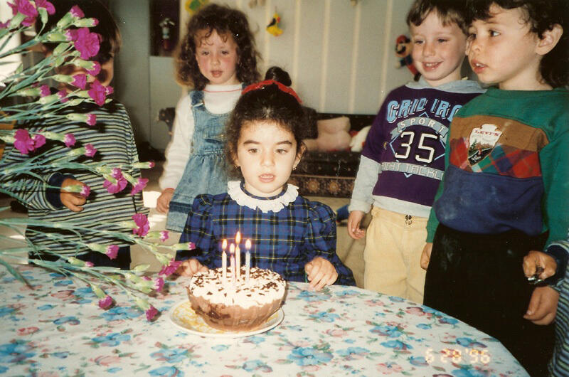 Untitled Children celebrating a birthday together