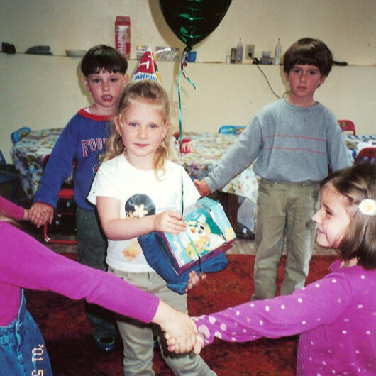 Untitled Children celebrating a birthday together