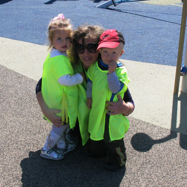 Lana with children during a field trip