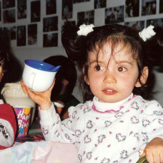 Child enjoying a meal at preschool