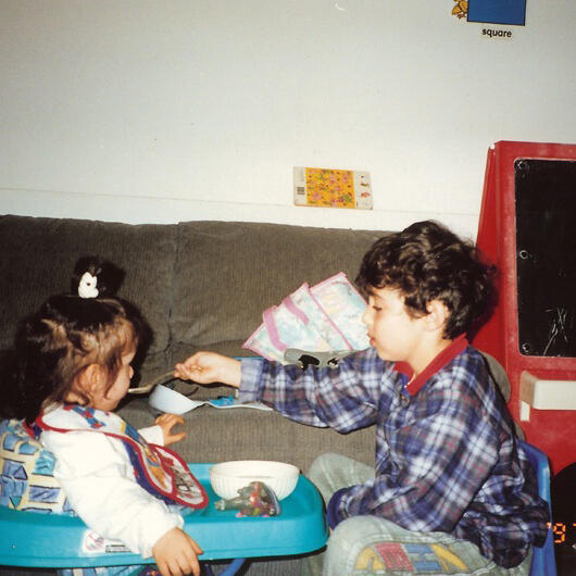 Untitled Children sharing a meal together