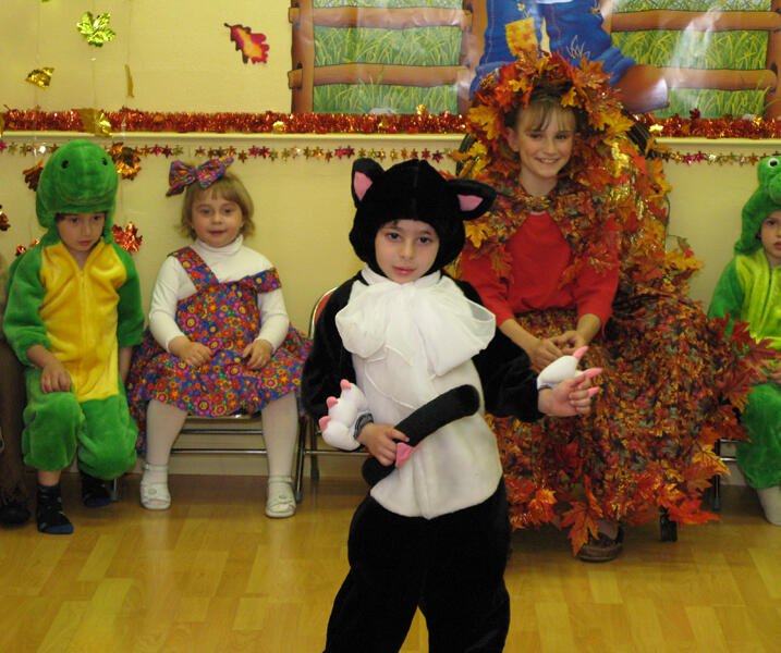 Children performing in creative costumes