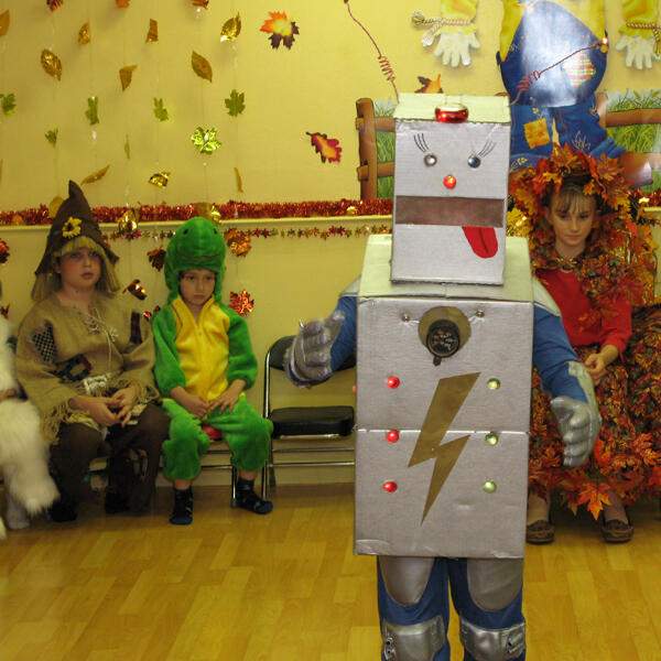 Children performing in creative costumes