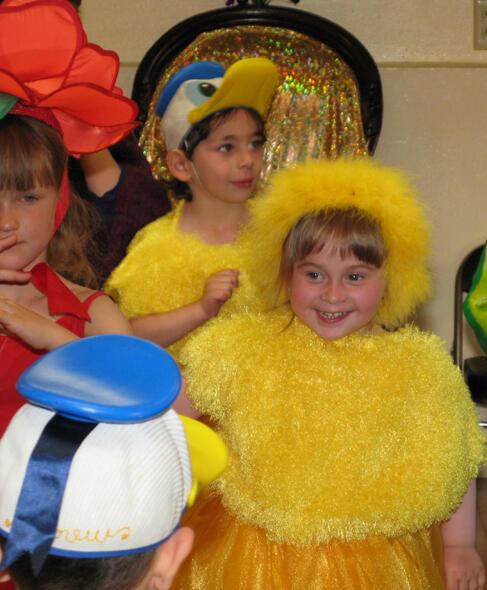 Child performing in a cat costume